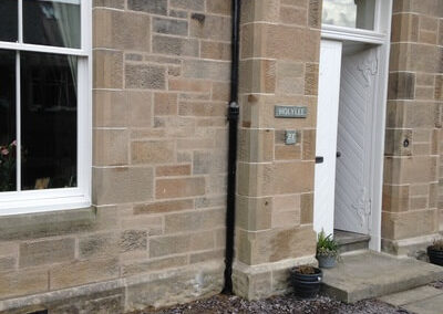 Peebles home repaired with lithomex and pointed with natural lime mortar.
