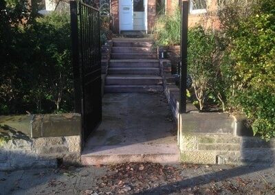 Wall cut away for new path and steps